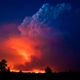 The Bootleg Fire sends a cloud climbing into the sky.